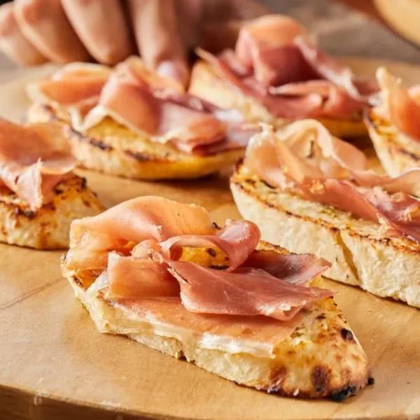 Pan al ajo con Prosciutto italiano.